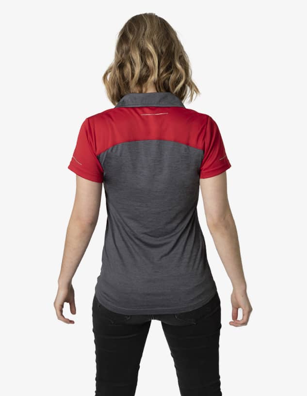 A polo shirt featuring a grey body with red sleeves and a logo on the back.
