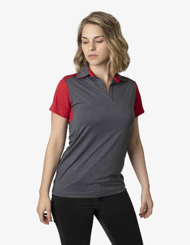A short-sleeved polo shirt featuring red sleeves and a grey body, displayed on a model. It has a logo.