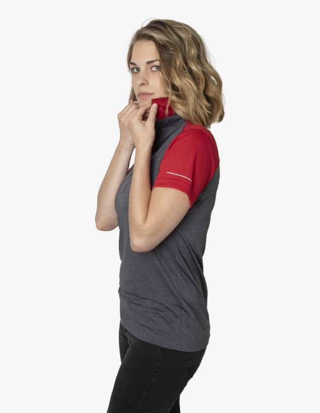 A fitted polo shirt featuring grey and red colours, with a collar and branding on the sleeve.