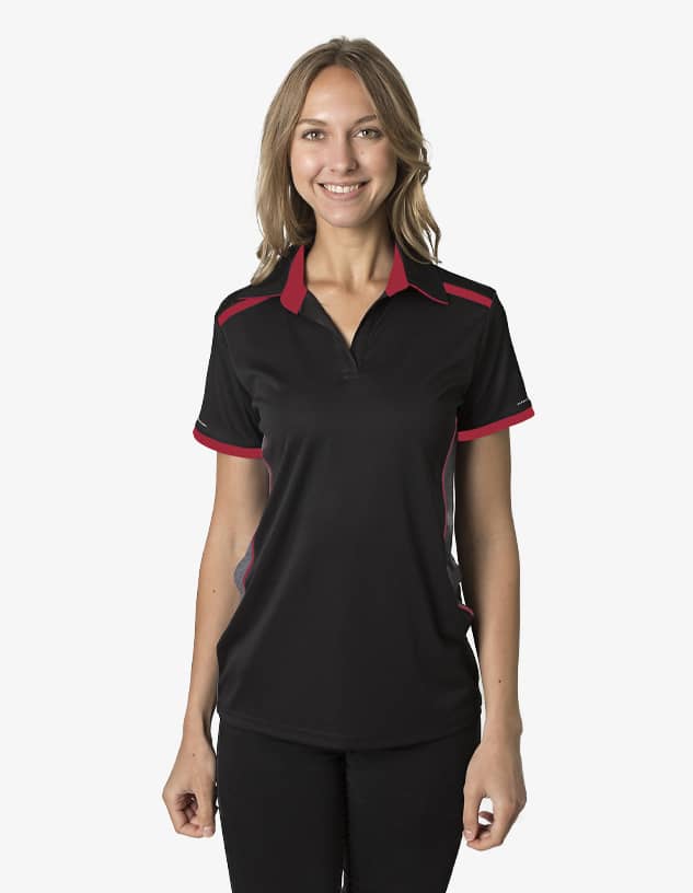 A black polo shirt with red accents and a logo, being worn by a smiling female model.