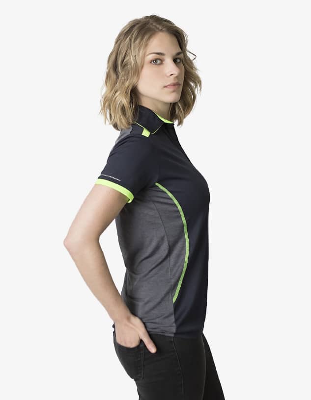 A polo shirt in navy with grey panels and lime green accents, featuring a logo on the sleeve.