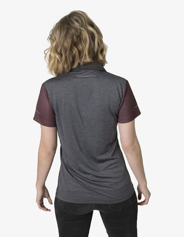 A grey polo shirt with red striped sleeves and a logo on the back, displayed on a model from behind.