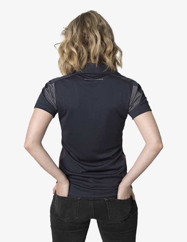 A women's polo shirt in navy, featuring a textured design and a logo on the back.