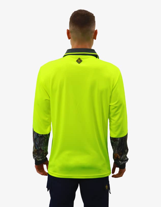 A work polo shirt in bright yellow with long sleeves featuring a patterned design on the arms and a logo.