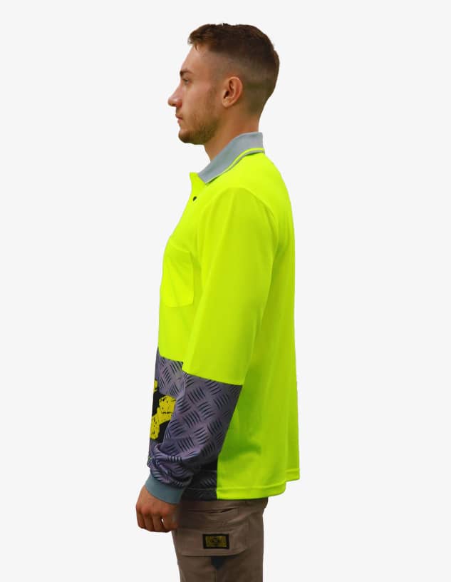A bright yellow long-sleeve polo shirt with grey patterned sleeves and a logo.