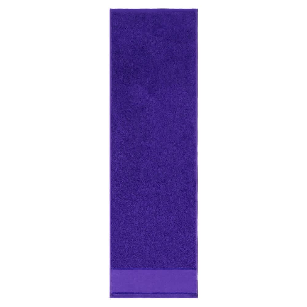 A purple gym towel featuring a solid colour design and a logo at one end. Ideal for leisure and outdoor activities.