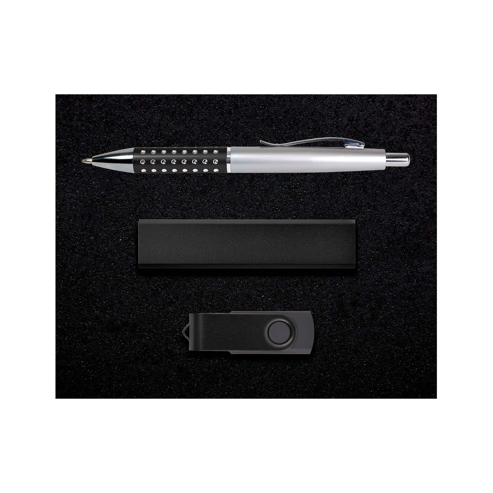 A gift set featuring a sleek pen with decorative accents, a compact USB flash drive, and a stylish box for presentation.