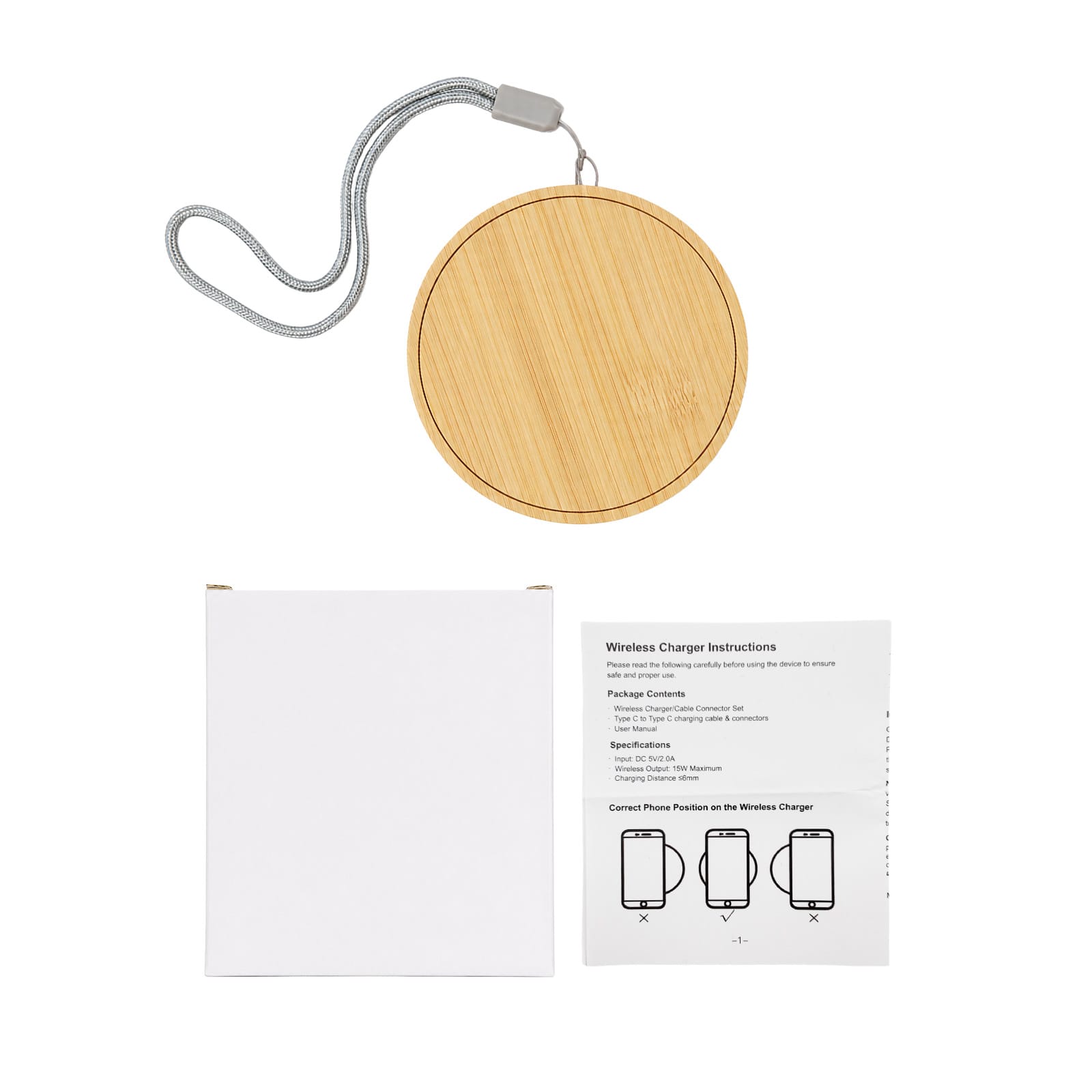 A bamboo wireless charger in a circular shape, accompanied by a plain box and user instructions.