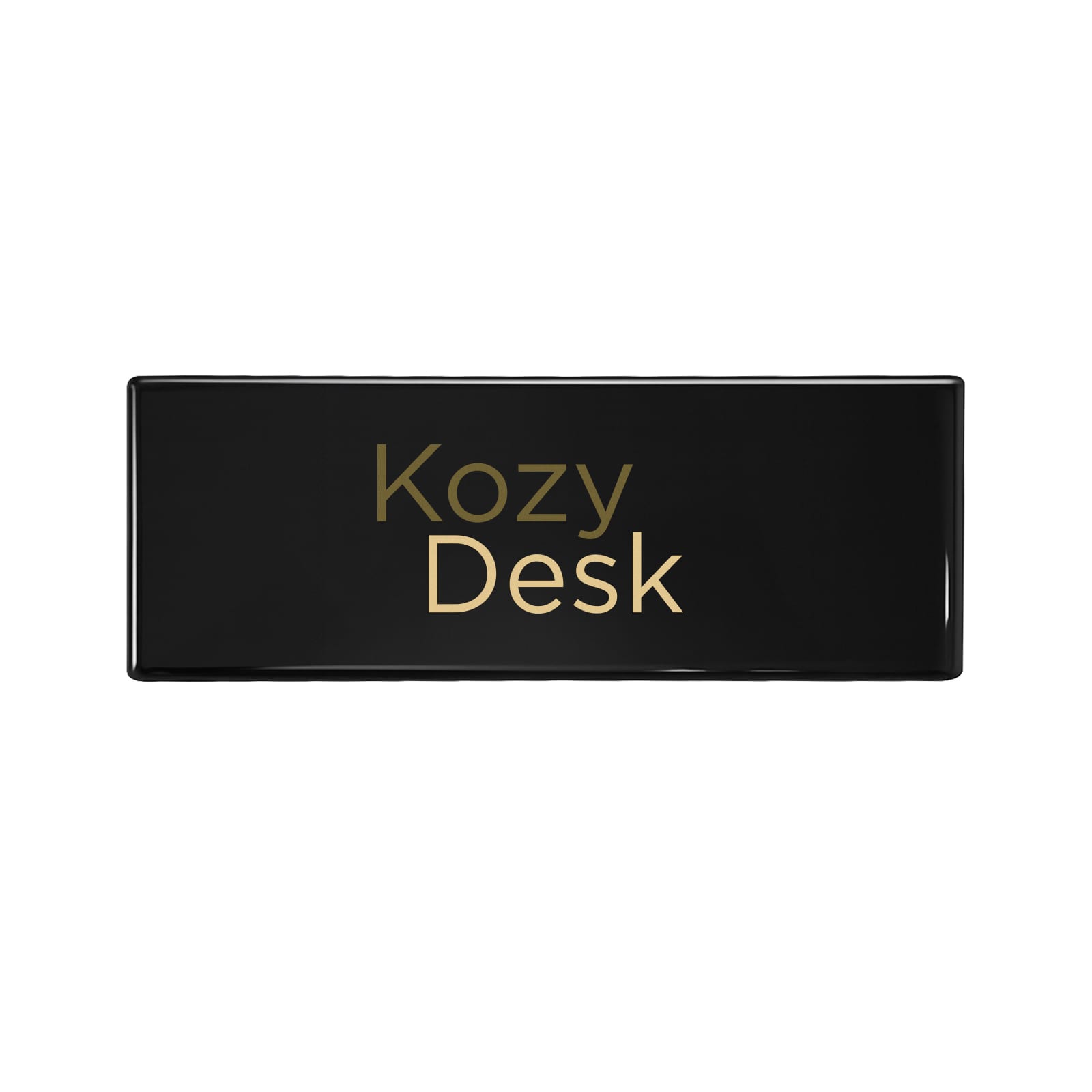 A sleek black desk with a gold logo featuring the text "Kozy Desk."