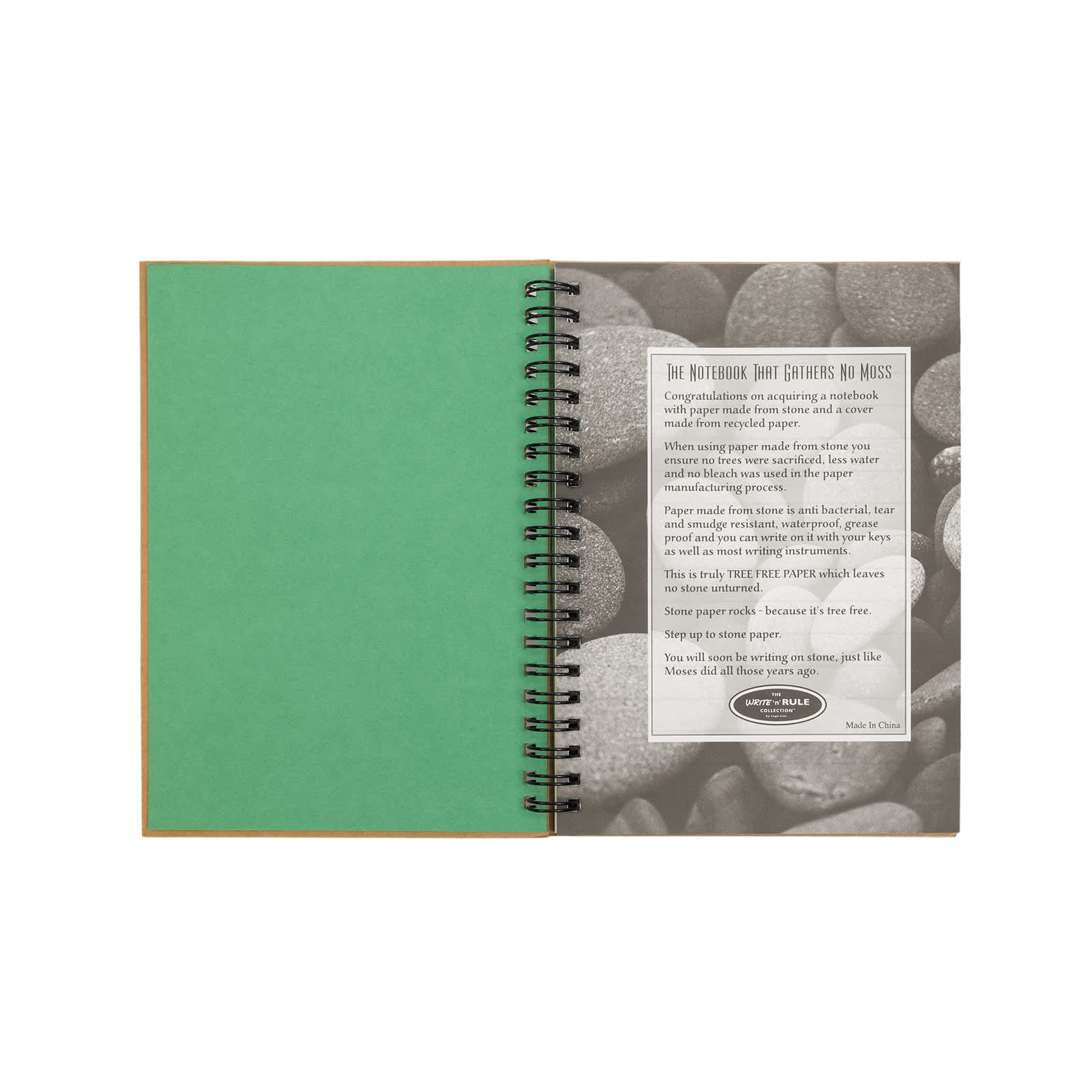 A green Stone Paper Notebook with a spiral binding, featuring a textured interior and a stone-like background.