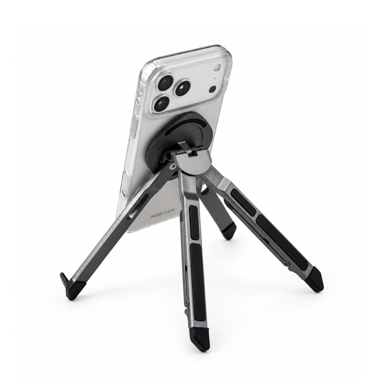 A silver and black Spider Device Stand holding a smartphone in a clear case, displaying its adjustable legs.