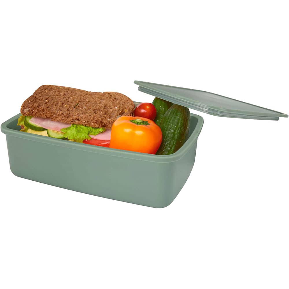 A green lunch box with a sandwich, cucumber, a tomato, and a bell pepper, topped with a lid. It features a logo.
