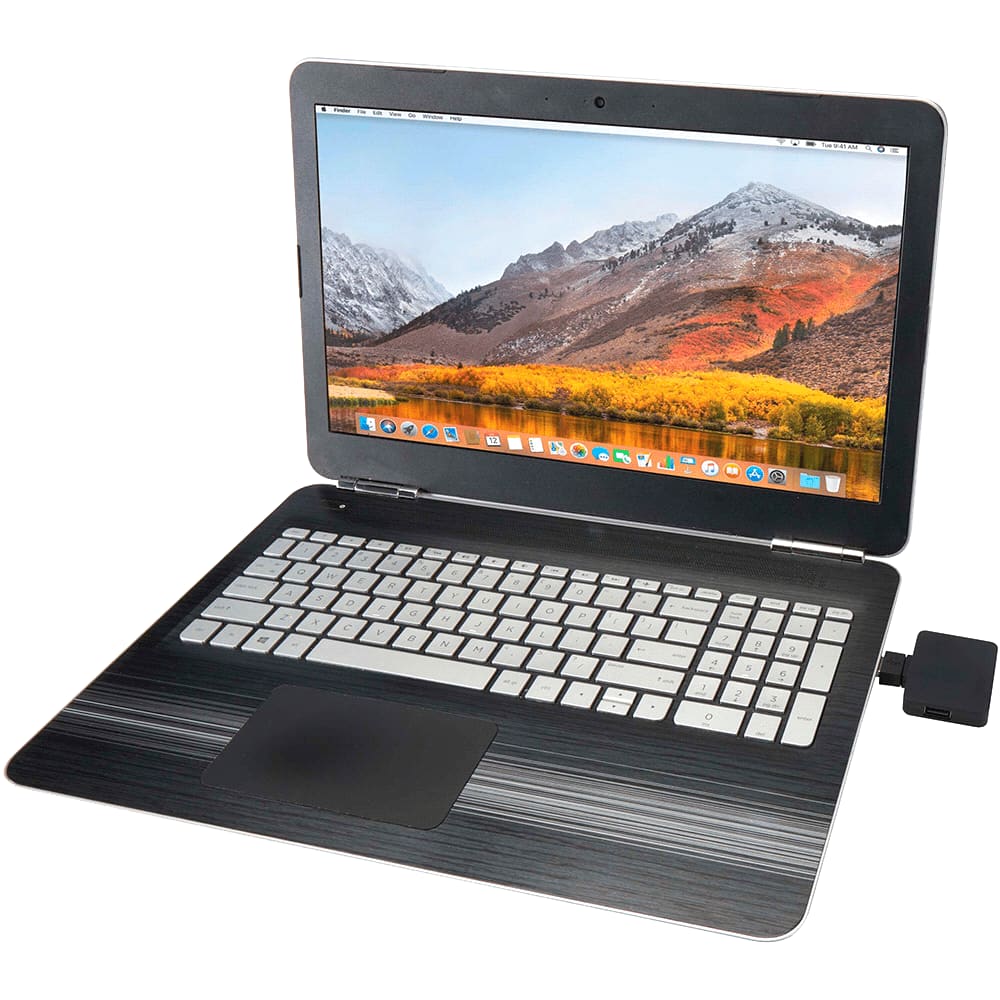 A laptop with a striped design, displaying a mountain scenery, and connected to a device on the side.