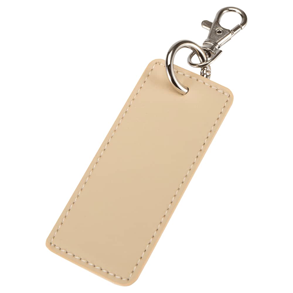 A rectangular keychain in a beige colour with a shiny silver clasp and stitching detailing.