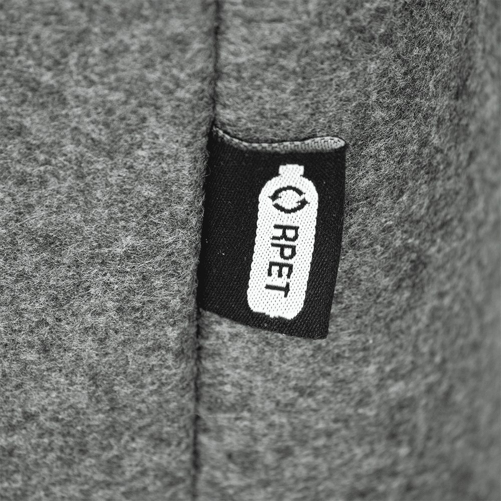 A grey felt cooler tote bag features a small label. The bag is made from recycled materials.
