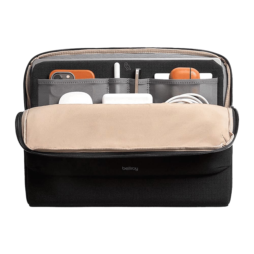A black laptop caddy with a beige interior, featuring multiple compartments for devices and accessories.