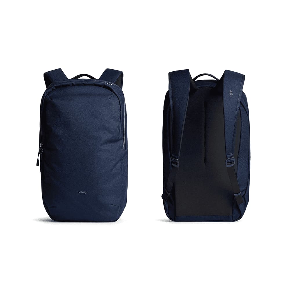 A navy backpack with a sleek design, featuring padded straps and a logo. Dual zip closures on the front and side.