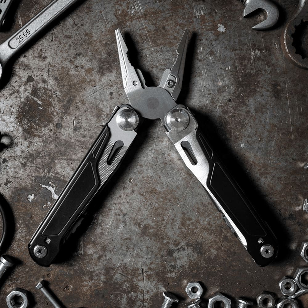 A black and silver multi-tool with pliers and various tools, surrounded by metal tools and screws. It features a logo.