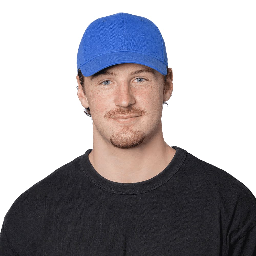 A blue organic cotton twill cap worn by a person, featuring a logo on the front. The individual is in a black shirt.