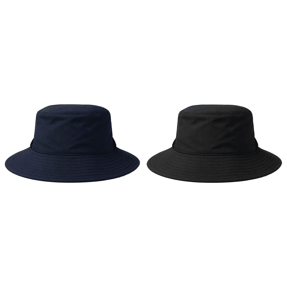 Two recycled surf hats are displayed, one in navy blue and the other in black, both with wide brims and a logo.