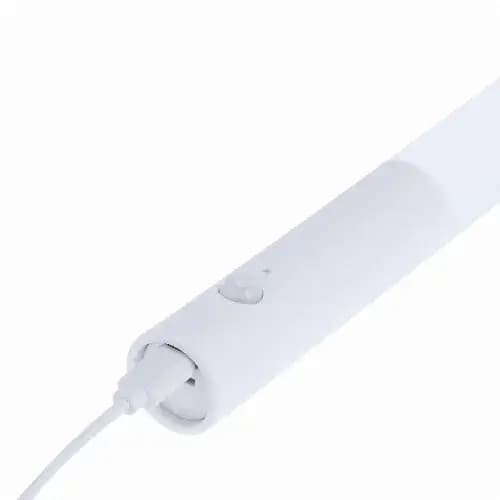A white torch featuring a button and a charging port, with a sleek design and a logo.