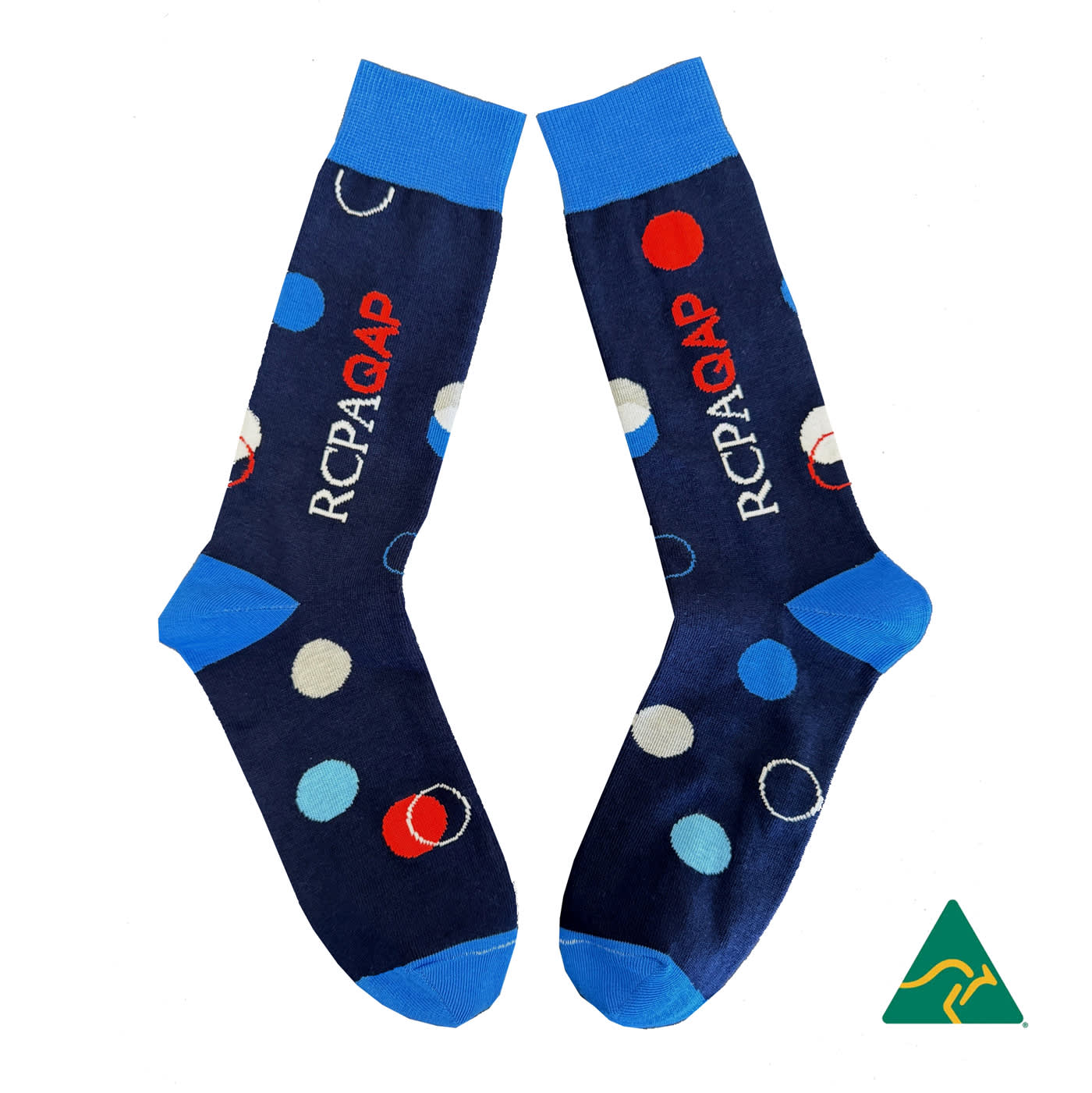 A pair of navy blue socks featuring multicoloured polka dots and a logo, with blue cuffs.