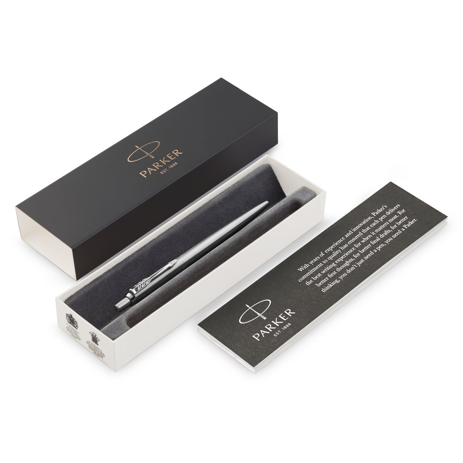 A brushed stainless steel ballpoint pen in a black and white box, featuring a logo and an informational card.