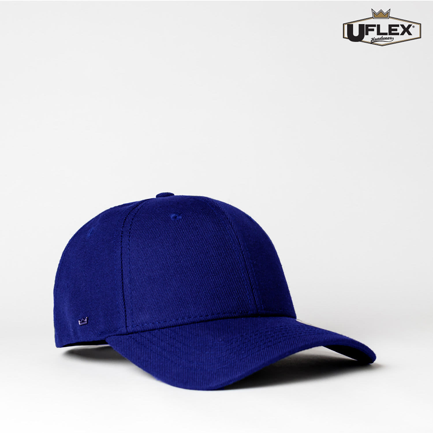 A navy blue six-panel snapback cap featuring a logo on the front. The cap has a structured design.