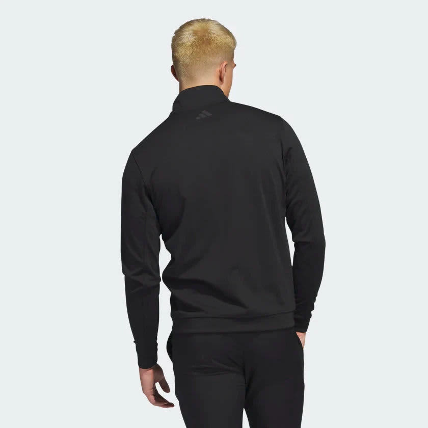 A black Adidas men's quarter zip pullover featuring a logo on the back, designed for casual wear.