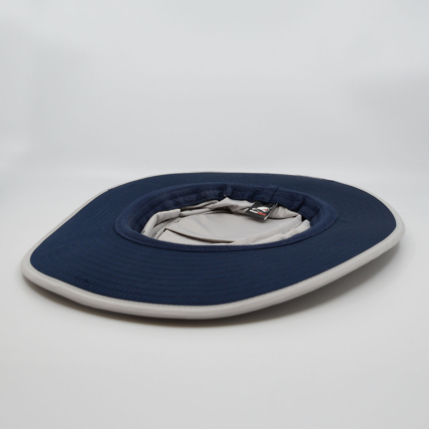 A navy and light grey sun hat with a wide brim and an inner lining. It features a logo.