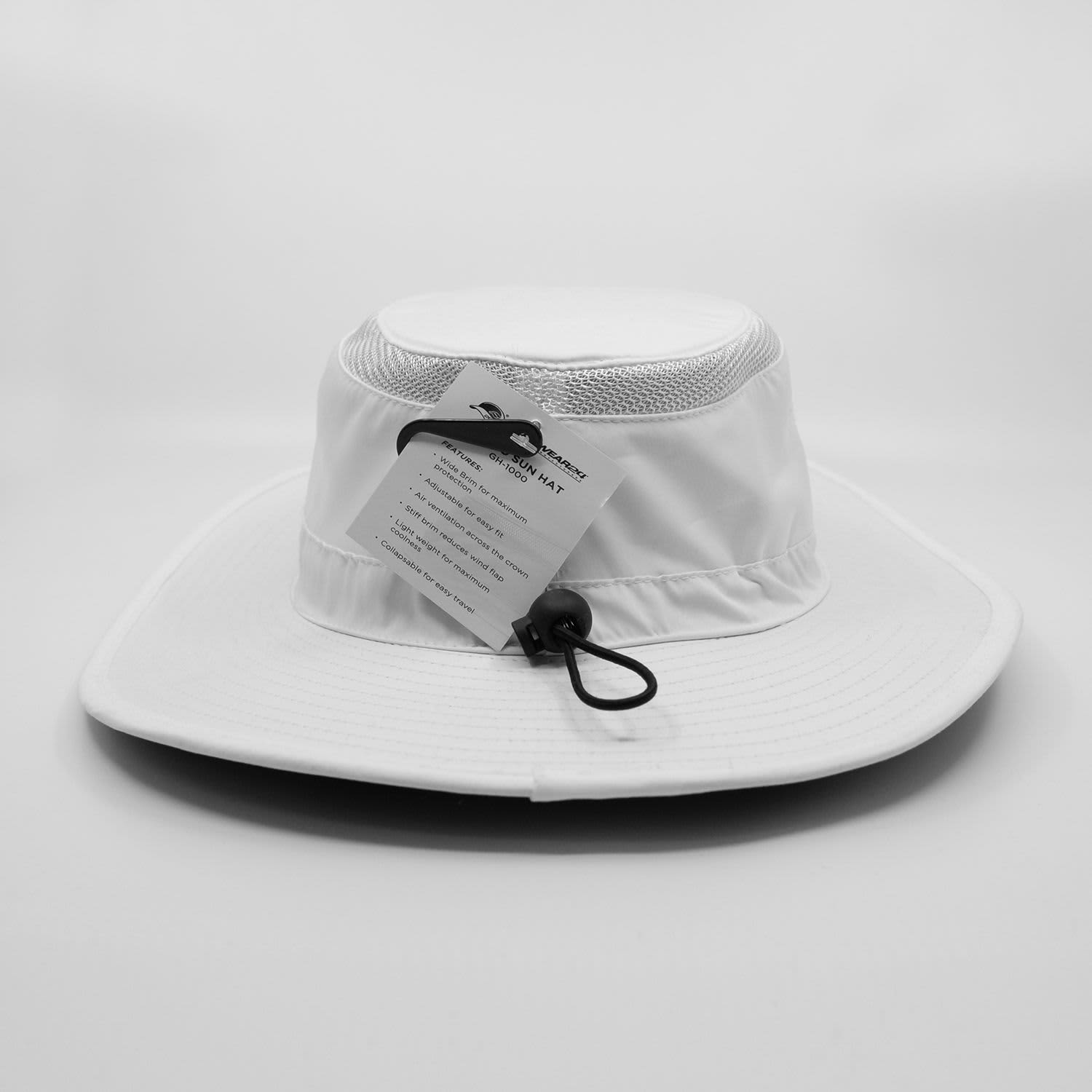 A white bucket hat with a wide brim and a chin strap, featuring a tag attached.