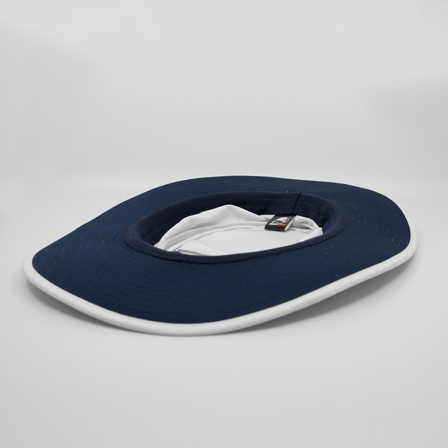 A navy blue Airflo Sun Hat with a wide brim, featuring a white interior and a tag inside.
