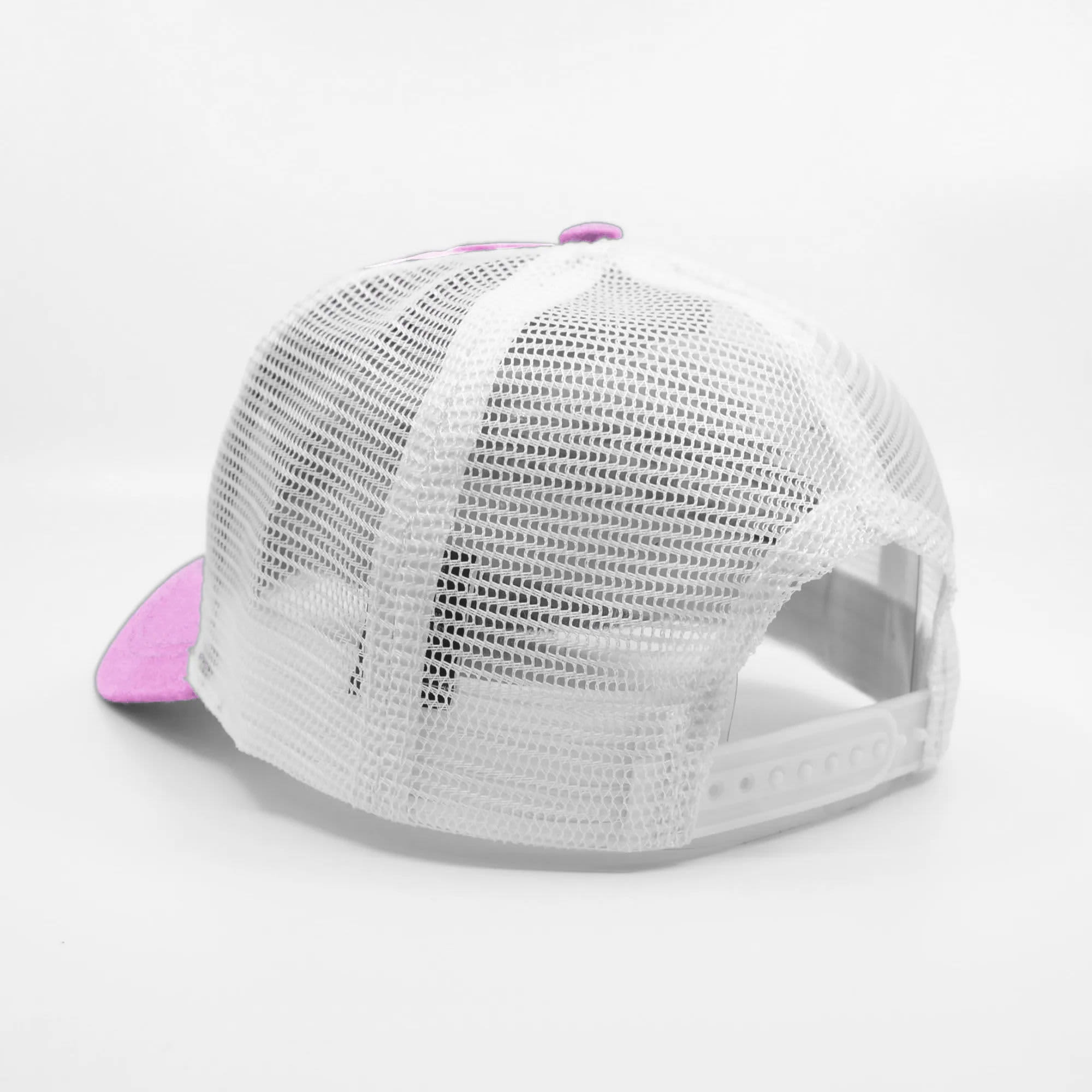 A pink and white trucker cap featuring a mesh back and an adjustable strap. It includes a logo.