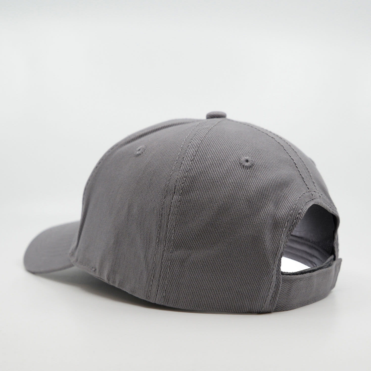 A grey six-panel brushed cotton cap with an adjustable strap and a branding logo on the back.