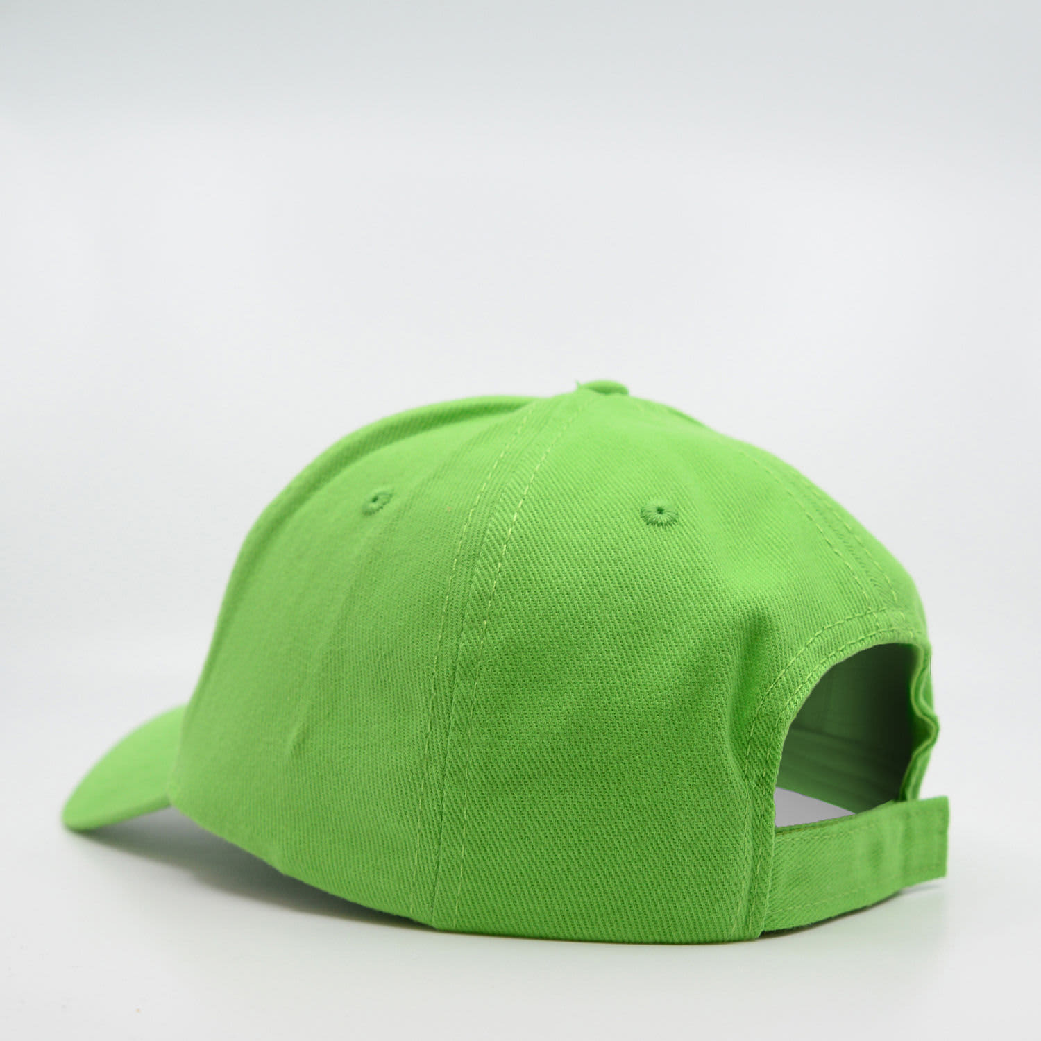 A green six-panel brushed cotton cap with an adjustable strap at the back and a branding logo.
