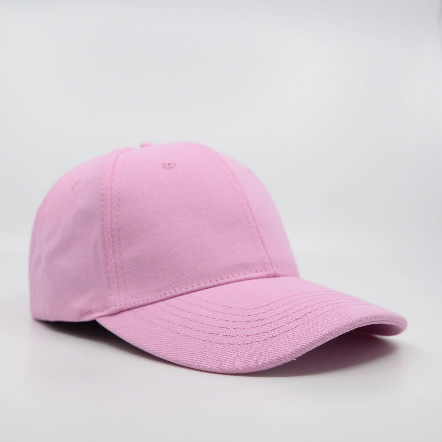 A pink brushed cotton cap with a six-panel design and a curved brim, featuring a logo.