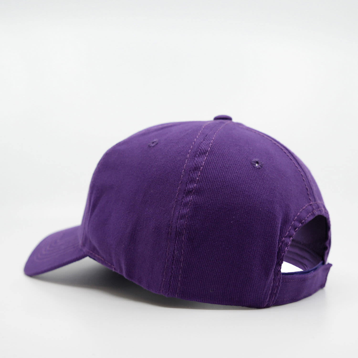 A purple brushed cotton cap featuring a panel design and a logo on the back.