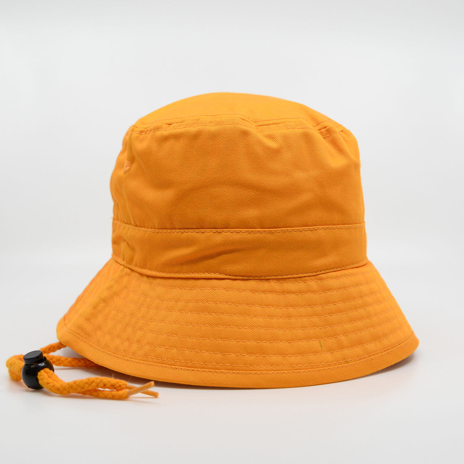 An orange HW24 Bucket Hat with a textured brim and adjustable chin strap. It features a logo on the side.