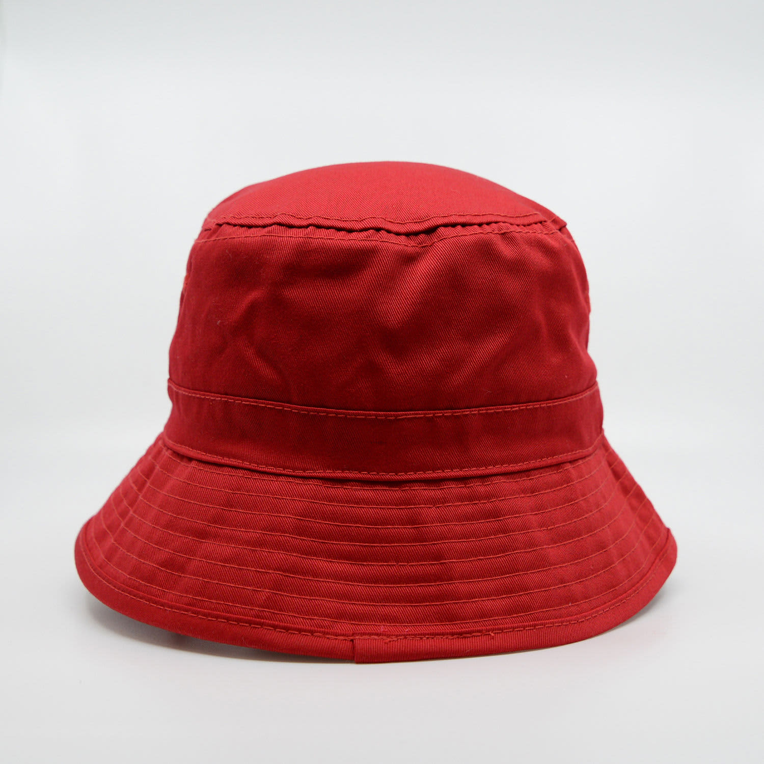 A red bucket hat with a wide brim and a stitched band around the crown, featuring a logo.