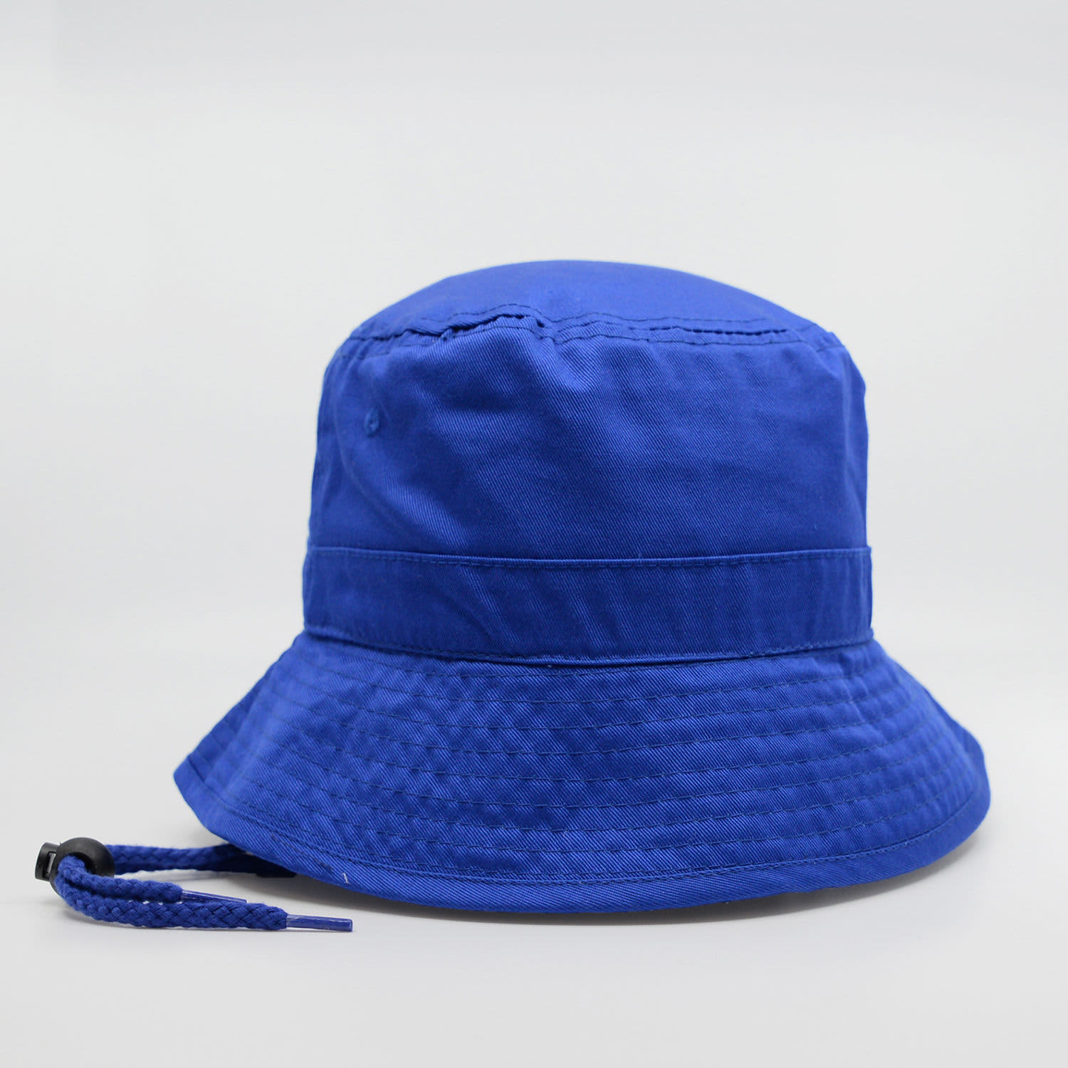 A blue bucket hat with a wide brim and an adjustable drawstring at the base. It features a logo.
