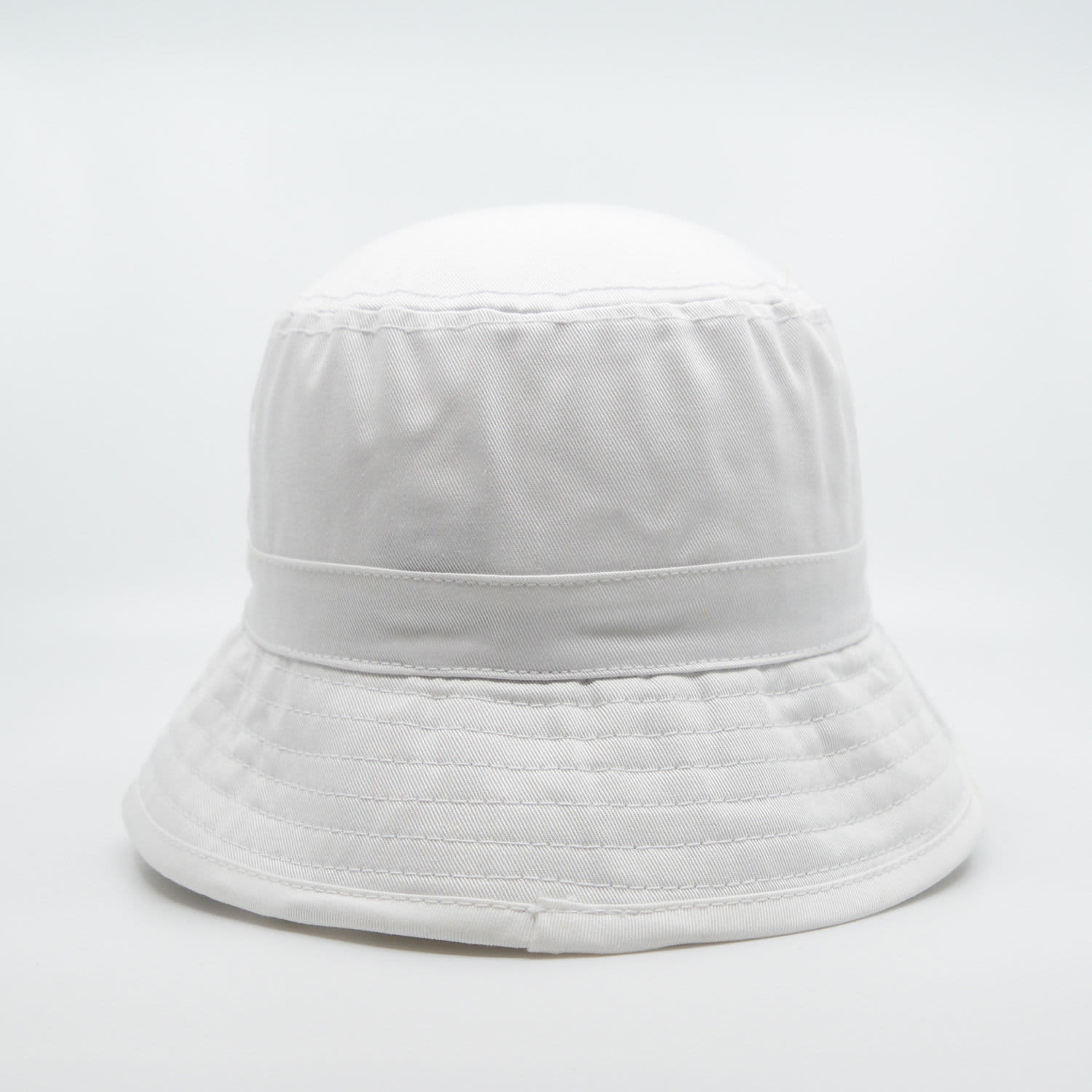 A white bucket hat with a wide brim and a textured band, featuring a logo on the side.
