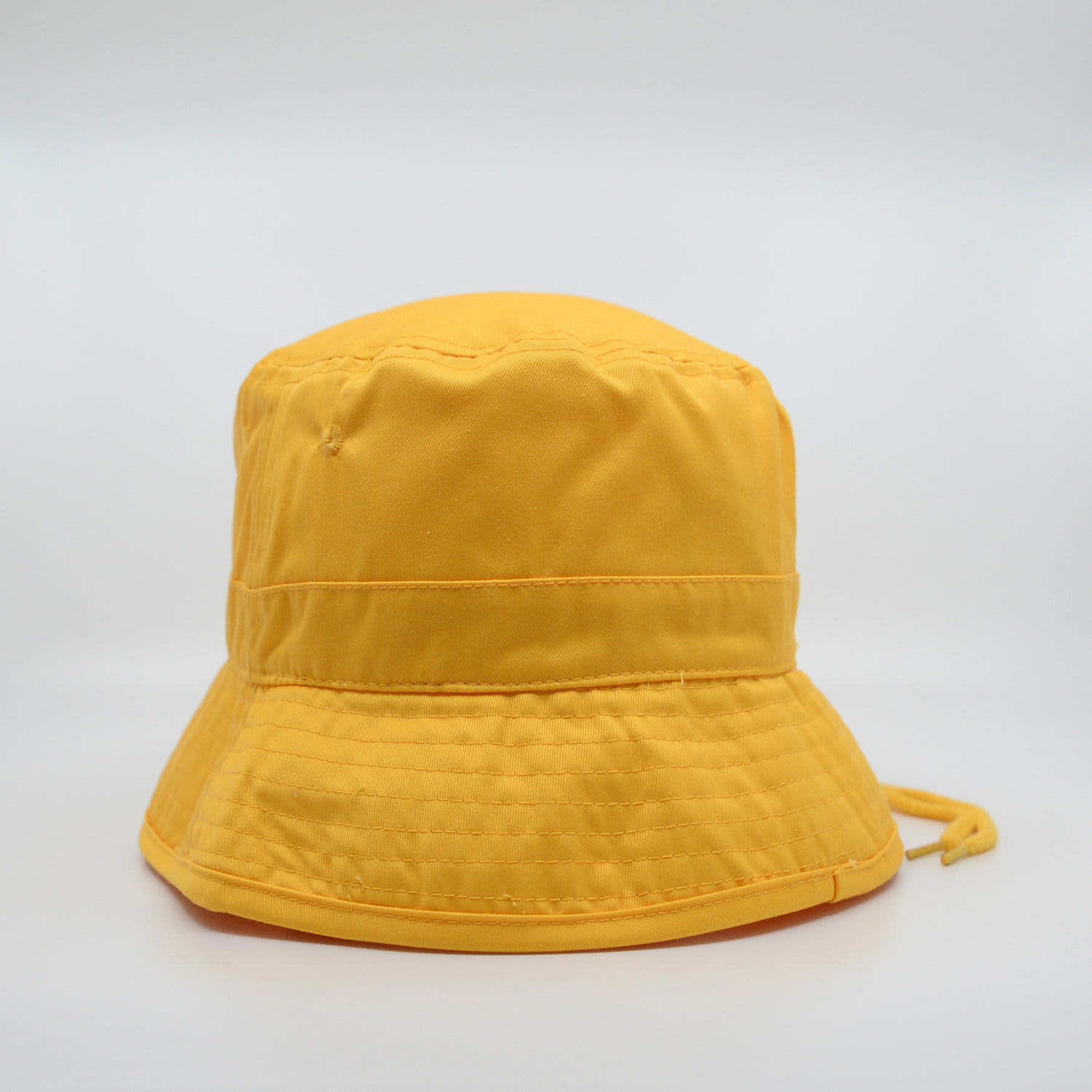 A yellow HW24 bucket hat featuring a wide brim and a drawstring, designed for headwear.