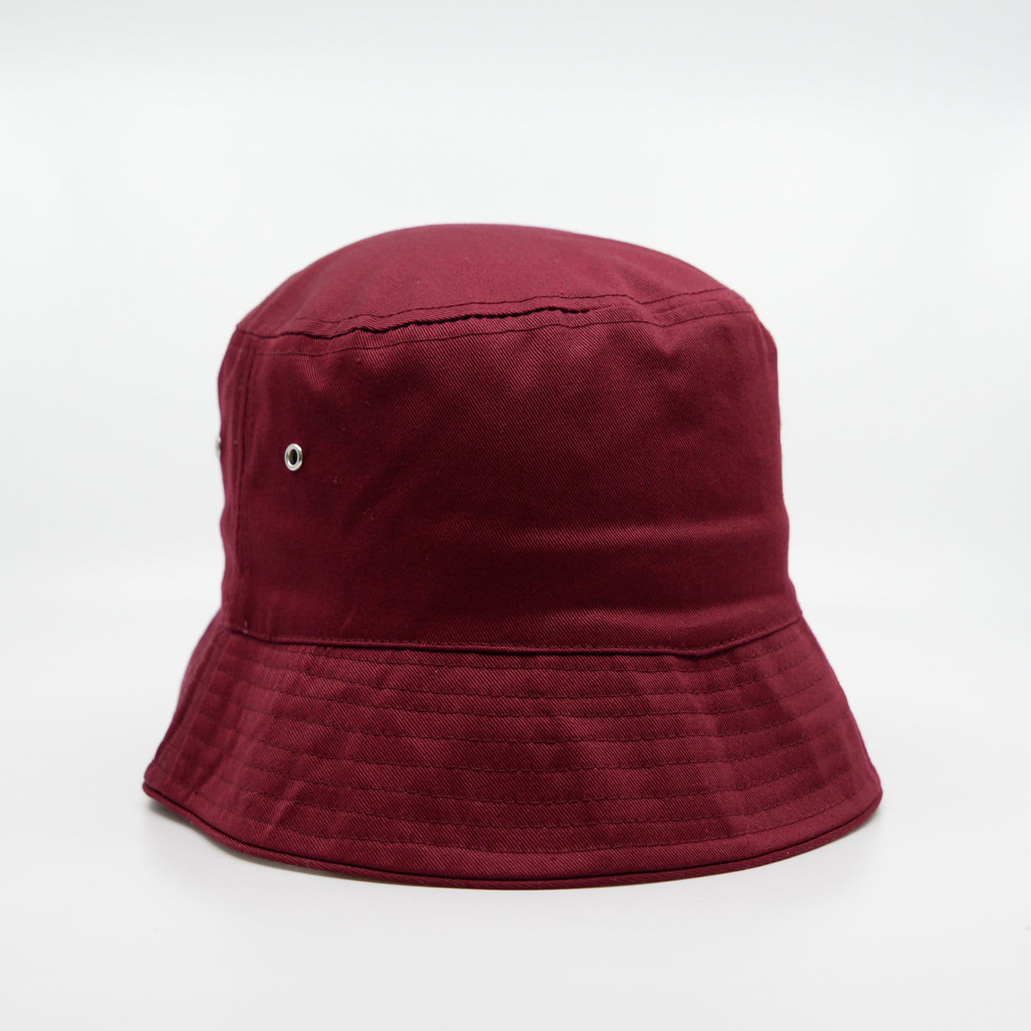 A burgundy bucket hat with a structured brim and a small logo on the side.