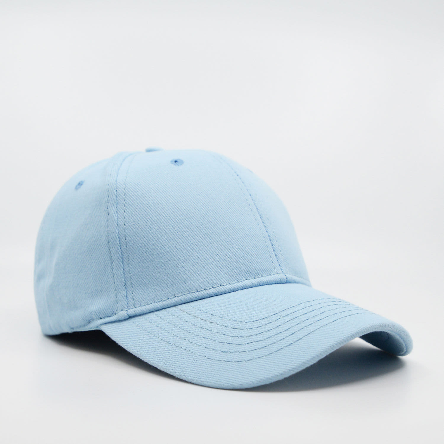 A light blue six-panel brushed cotton cap with a curved brim and a logo on the side.