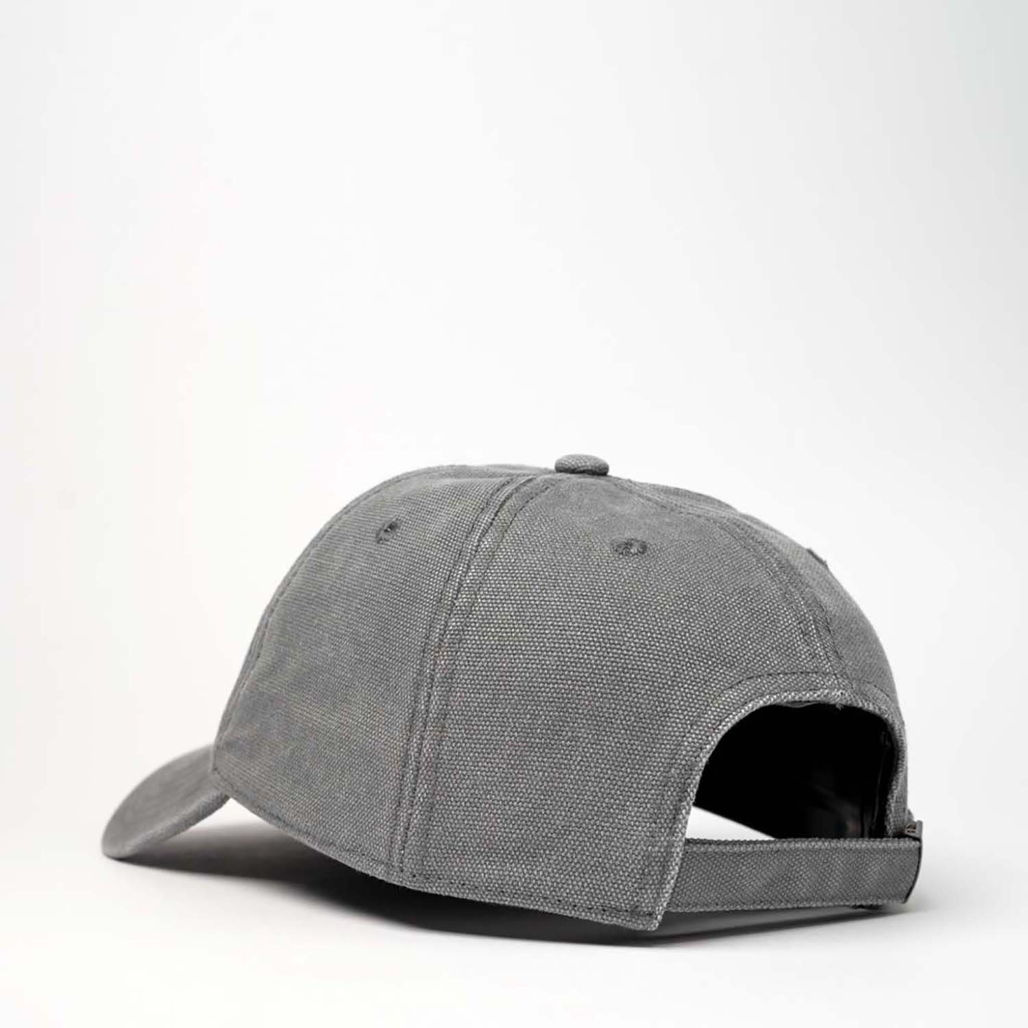 A grey cotton canvas unstructured 6 panel cap featuring a curved brim and an adjustable strap at the back.