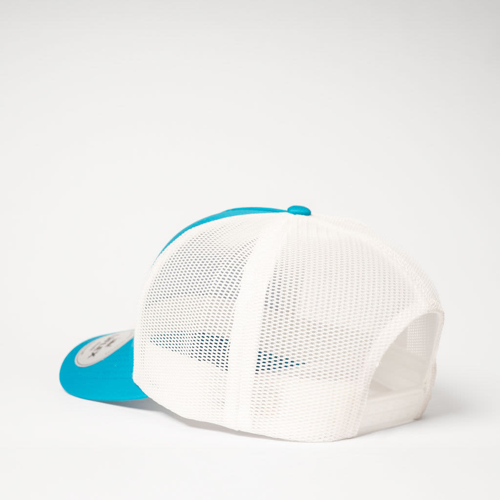 A five-panel trucker cap in white and turquoise with a mesh back and a curved peak.