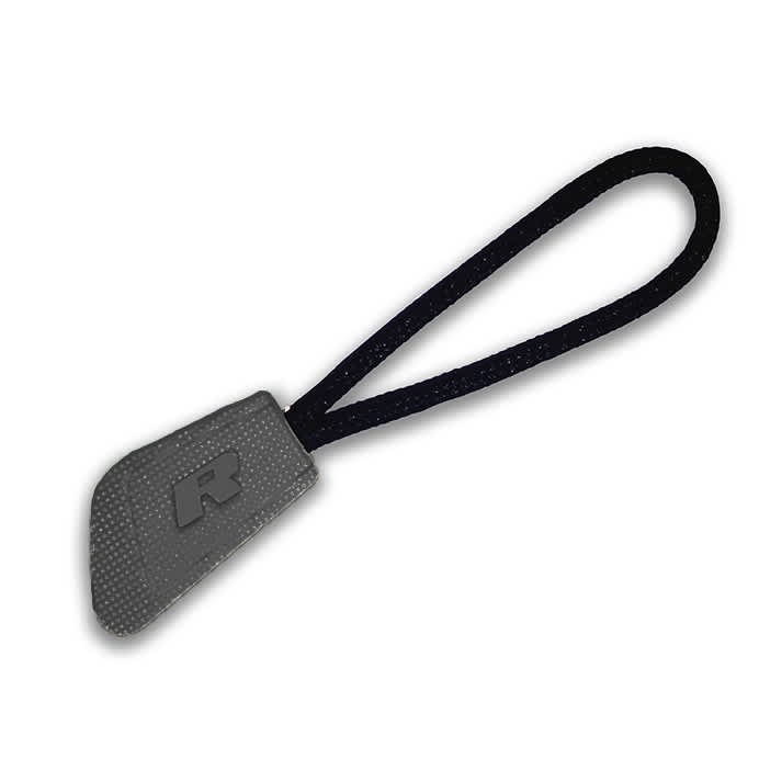 A grey interchangeable zip puller with a black fabric loop, featuring a logo on the pull tab.