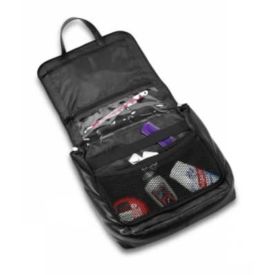 A black leather toiletry bag featuring multiple compartments and a handle for easy carrying.