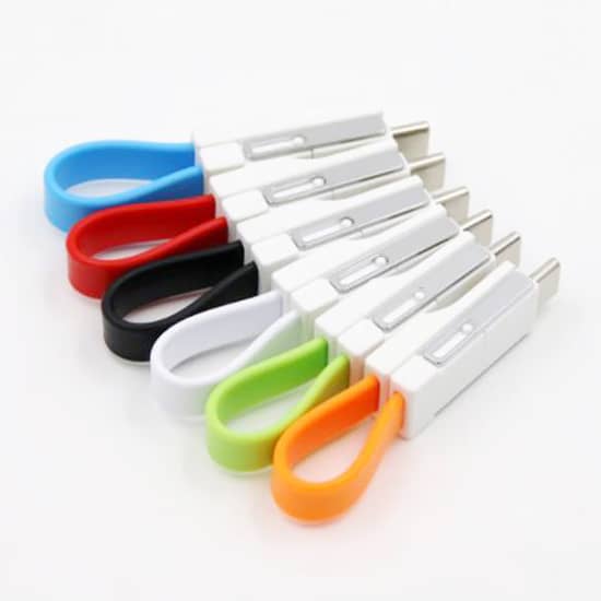 A collection of 3 in 1 USB cables in blue, red, black, white, green, orange, and grey, featuring a logo.