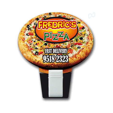 A round magnet shaped like a pizza, featuring a colourful design and a clip at the bottom. It includes a logo.